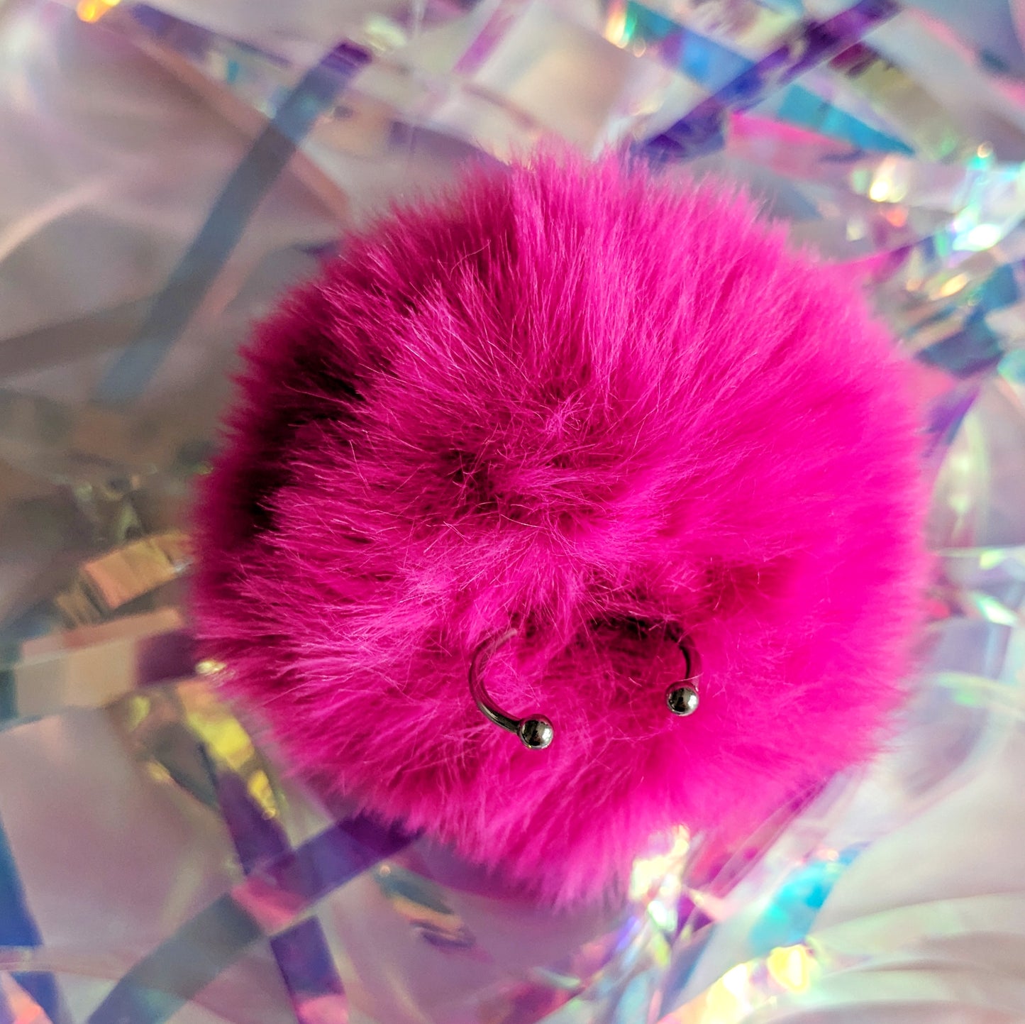 Large fluffy pink Pom Pom Ring with adjustable ring base
