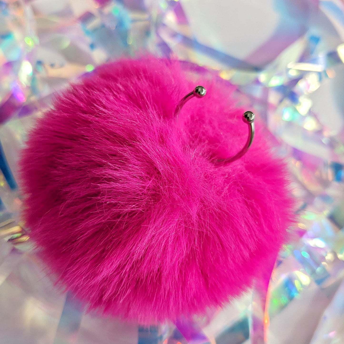 Large fluffy pink Pom Pom Ring with adjustable ring base