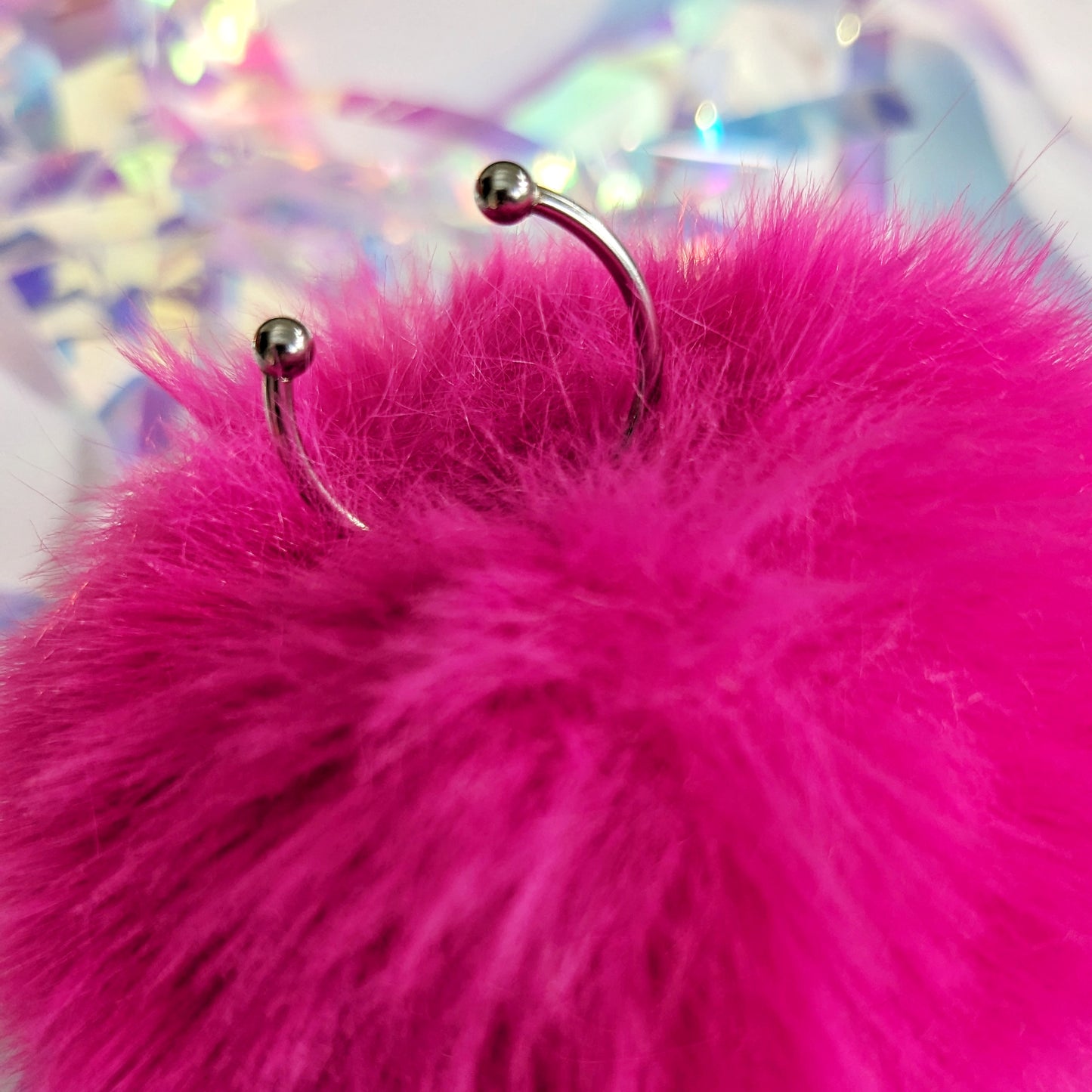 Large fluffy pink Pom Pom Ring with adjustable ring base