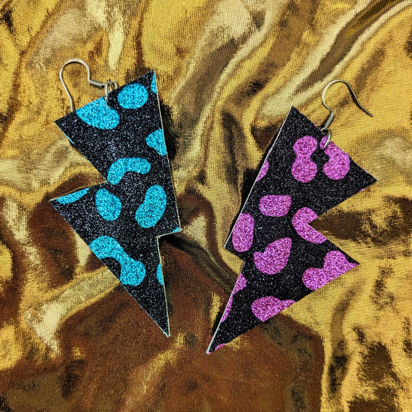 Medium Leopard Print lightning bolt earrings in Pink and turquoise Edit alt text